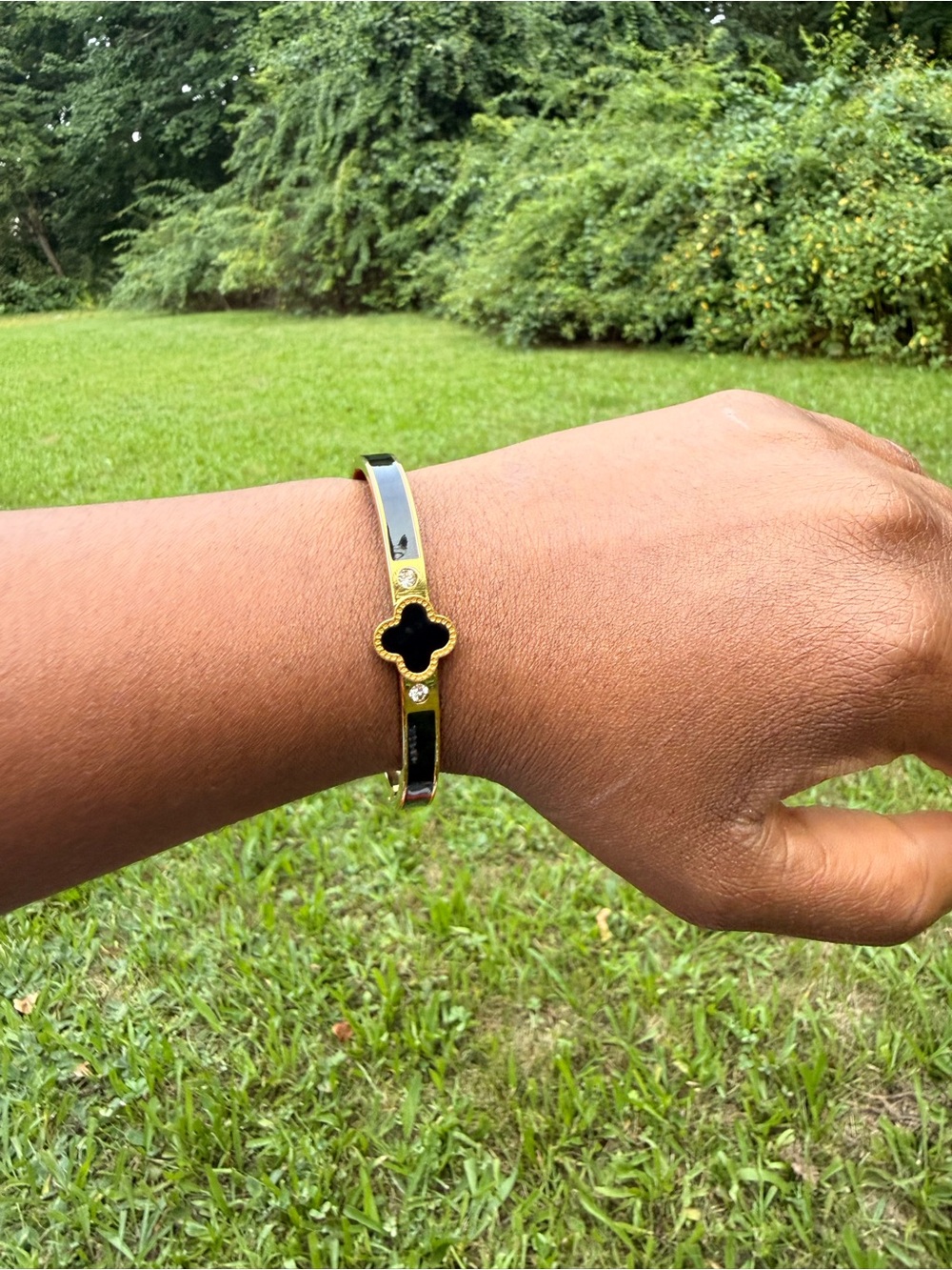 Elegant Gold-Tone Black Clover Bangle Bracelet